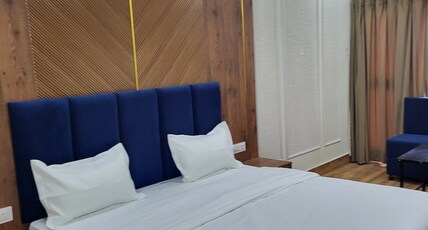 MG Kitchen ( Hotel & Restaurant) Room Type - Ultra Deluxe Room