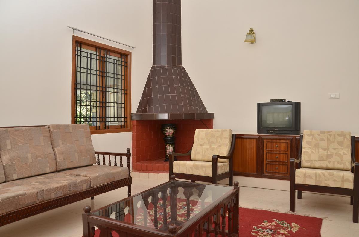 Serenity Manor Homestay | Rooms & Caretaker - Tap to explore photos