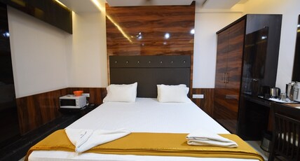 Atharva Hotel by M Square. Room Type - EXECUTIVE KING BED ROOM