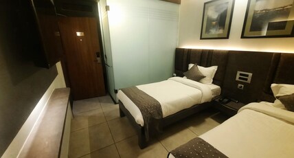Hotel Ranbirs Alambagh Room Type - Deluxe Twin Room, Free Vallet Parking, 10 Percent Off On Food Bill, Outside Food Not Allowed, Amenit