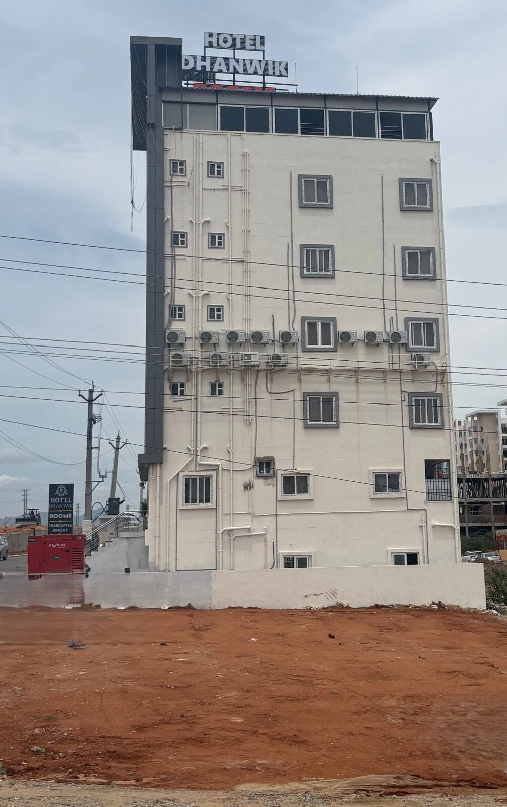 Hotel Dhanwik - Tap to explore photos
