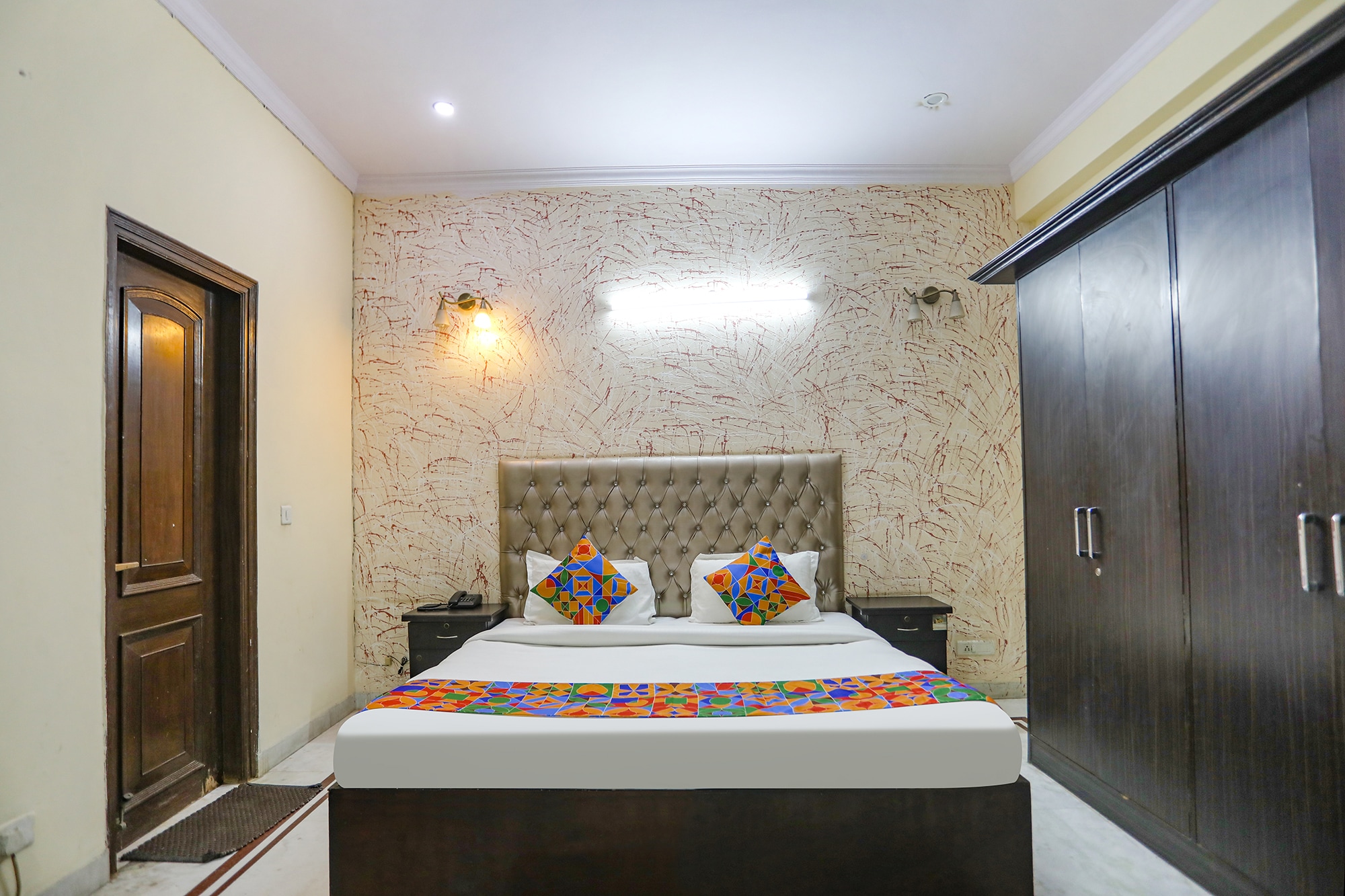 FabHotel HM Palace - Tap to explore photos