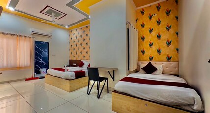 Hotel Santosh Palace (Free Gated Parking & 10 Minutes walk from Temple) Room Type - Deluxe Triple Room ( 1 Double Bed + 1 Single Bed | 3 Pax )