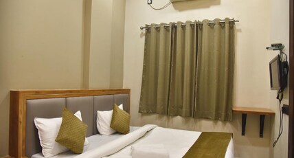 Hotel Aarchi International @Raipur Railway Station Room Type - Deluxe AC Room