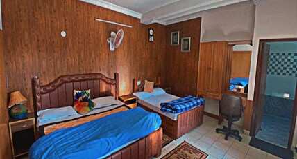 Hotel Centre Point ,Palampur Room Type - The Cosy Heaven Family Suite