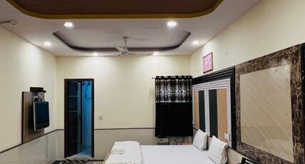 Ajay Guest House Room Type - Triple Bed Room ( 1 Double Bed + 1 Single Bed )