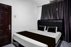 Hotel O near Masjid Raya Al-Mashun formerly Hotel Wisma Yuli