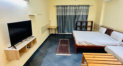 Samriddhi Studio Apartment Room Type - Family Deluxe Room with Kitchen, Smart TV, Wifi, Parking