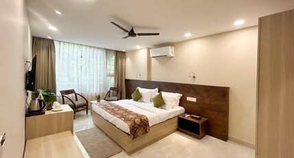 Iris Suites Kalkaji Room Type - Premier Room with Mini Fridge and Smart TV