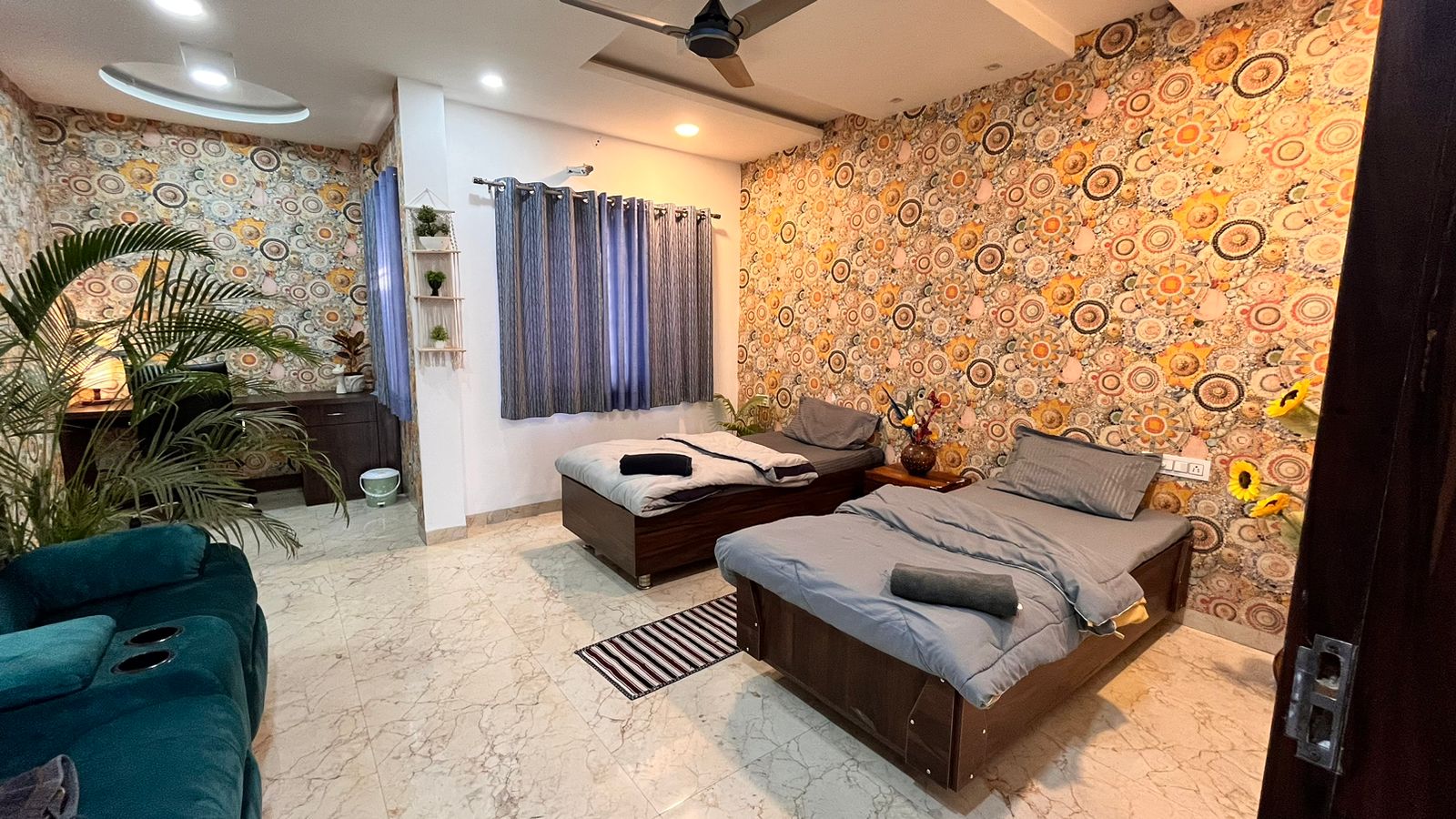 HOMLY STAYS 3 BHK - Tap to explore photos