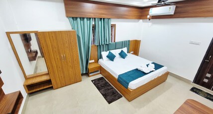 S K Airport Lodge | Guwahati Room Type - Deluxe Room with Kitchen