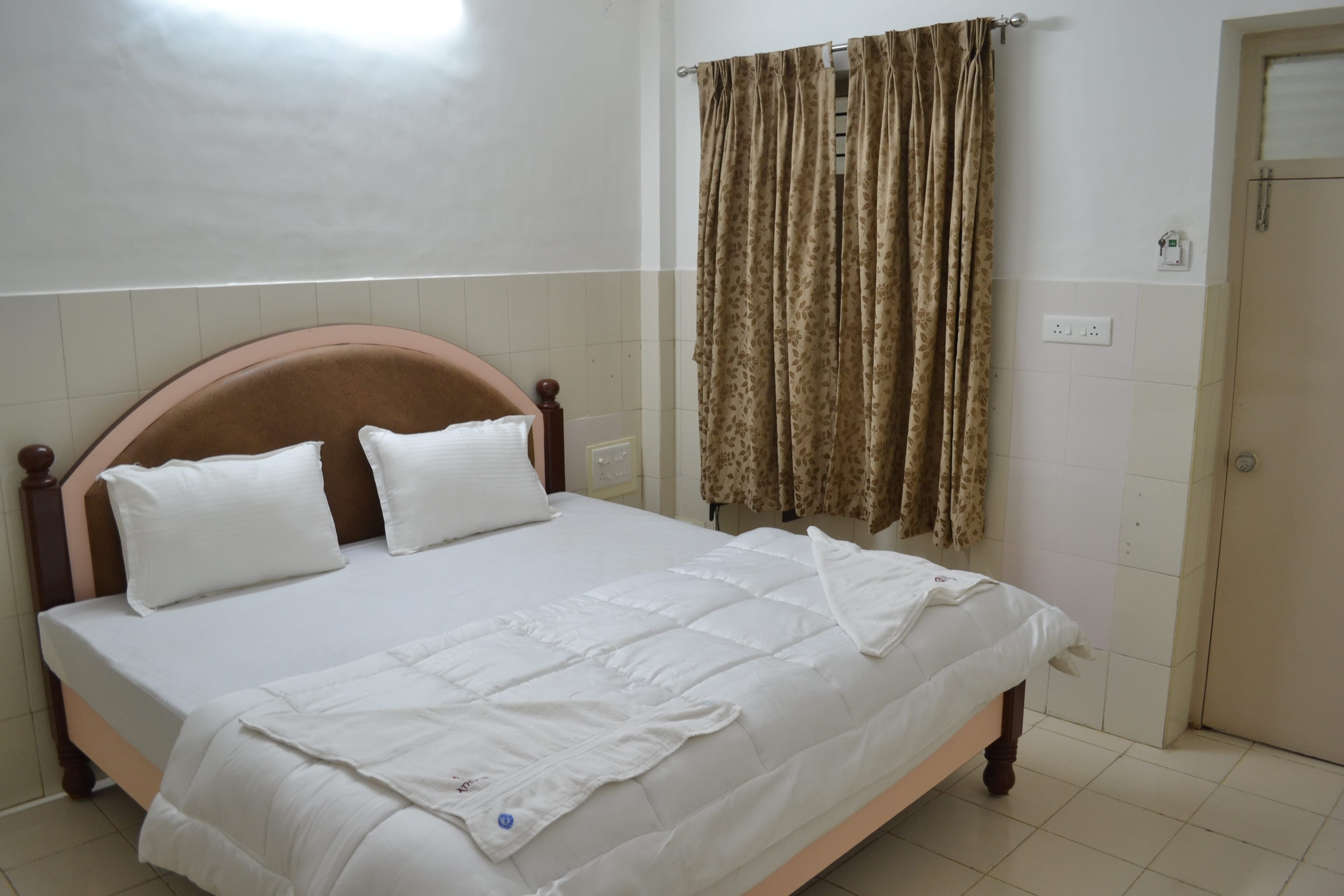 HOTEL ATHIDHI INN - Tap to explore photos