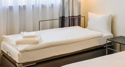 Novotel Munchen City Arnulfpark Room Type - Standard room with 1 double bed and sofa Novotel Munchen City Arnulfpark Room Type - Standard room with 1 double bed and sofa