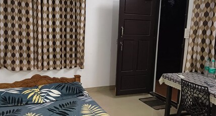 Lemontree Homestay Room Type - A/C Deluxe Room complimentary breakfast