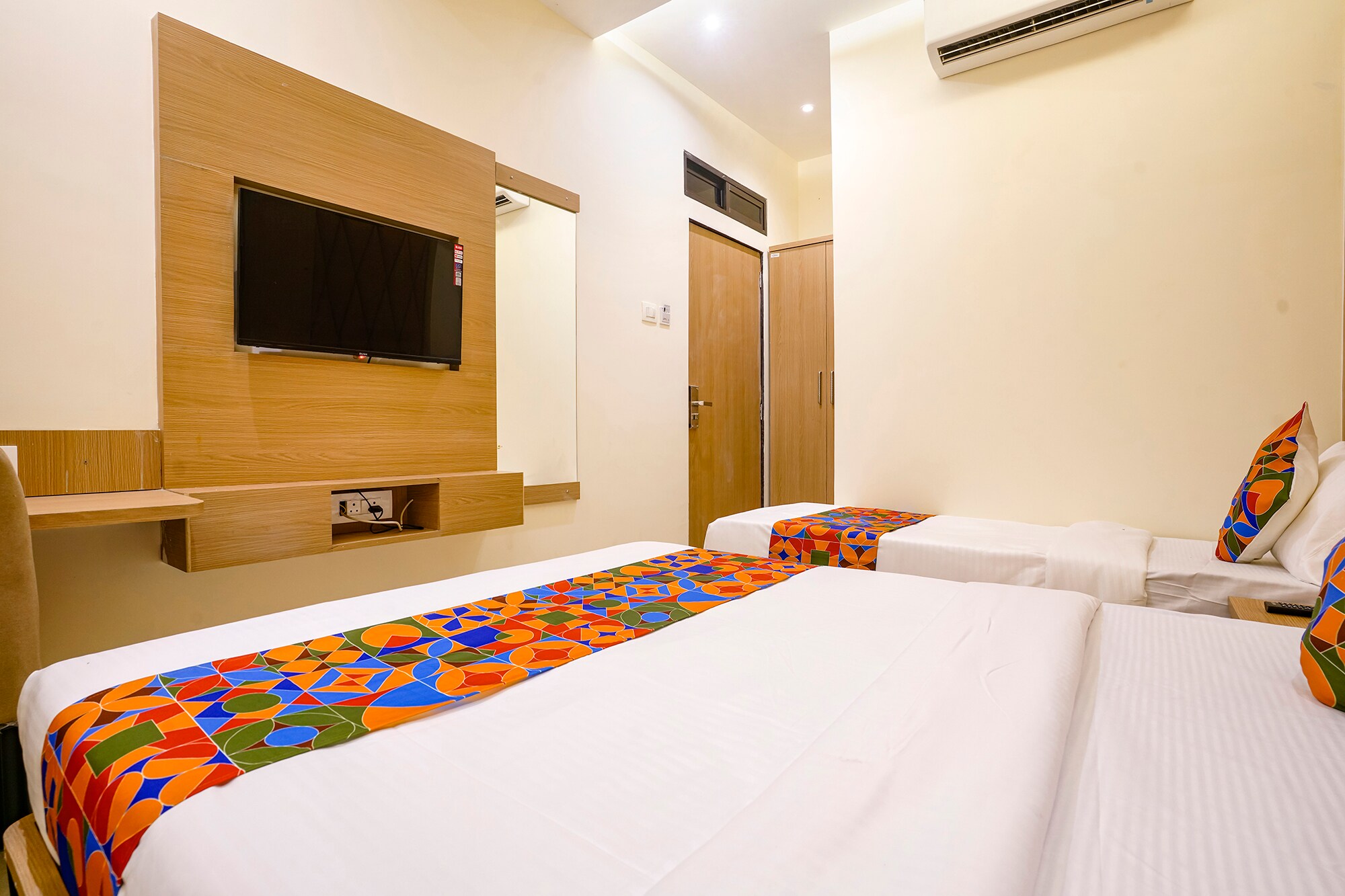 FabHotel Prime Palm Grove - Nr. BKC - Tap to explore photos