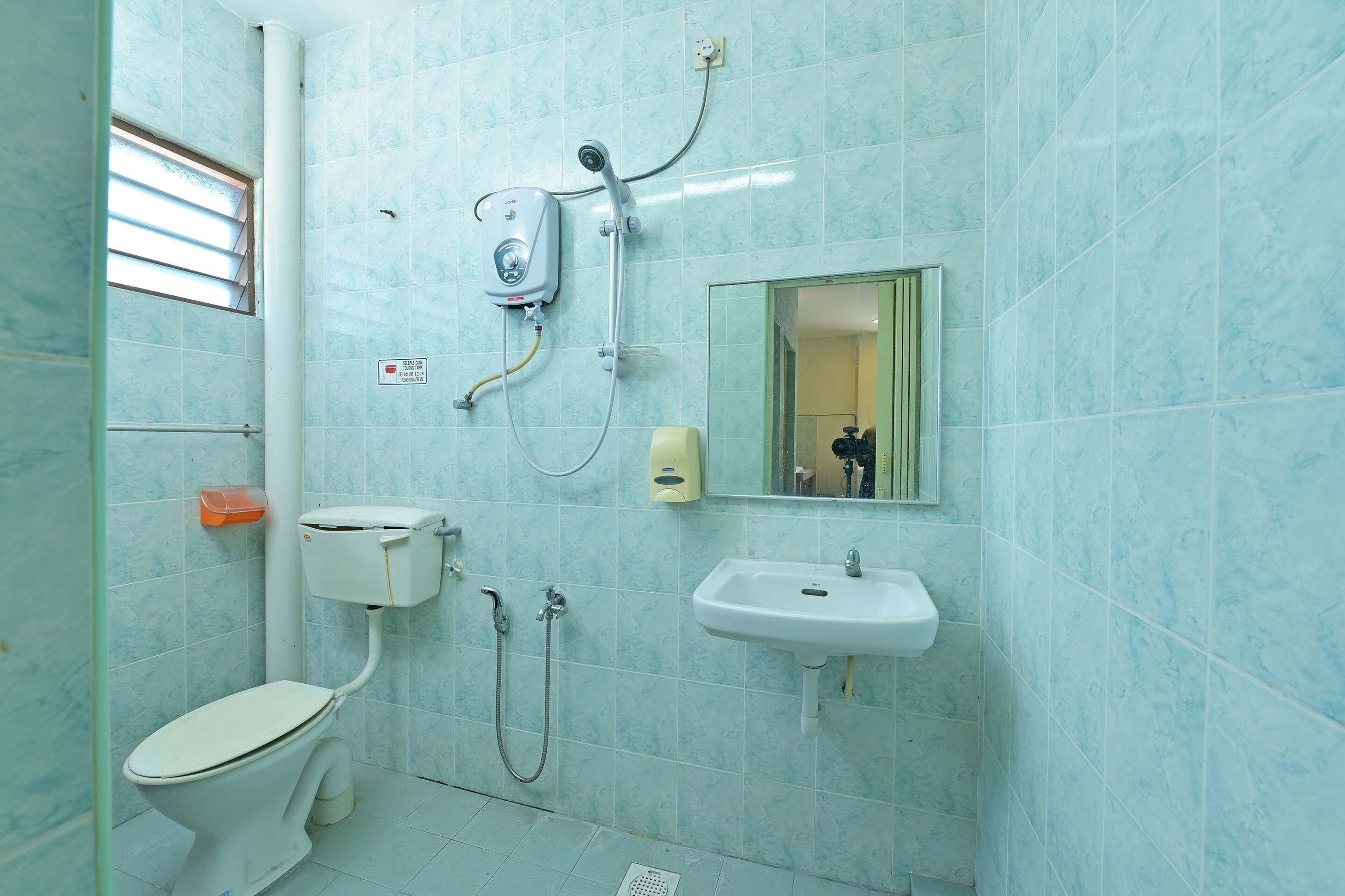 SPOT ON 89907 Motel Impian - Tap to explore photos
