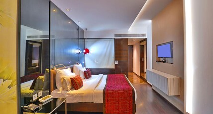 HOTEL THE GAUR Room Type - Deluxe Room with Round Glass Shower Cabinet and F&B Deals