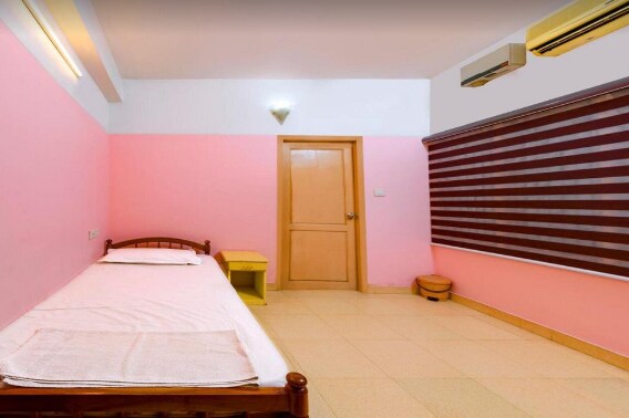 Rams Guest House Technopark - Tap to explore photos