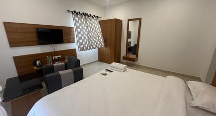 SRI RAMAJAYAM LUXE. Room Type - DELUXE ROOM