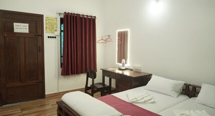 Suryas Stay Inn Room Type - Standard Non AC Room