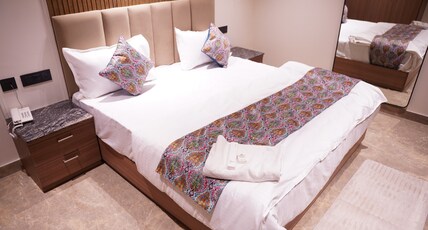 HOTEL ELVILLA Room Type - Super Deluxe Room