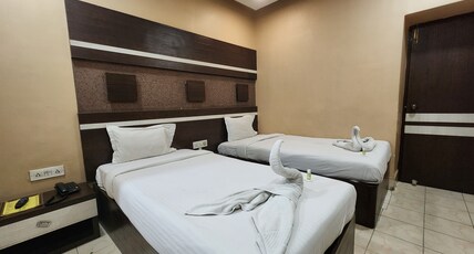 Hotel Pushpak International Room Type - Premium Twin Bed with Free Wifi