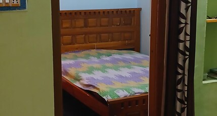 Sree Krishna homestay Room Type - Deluxe King Room