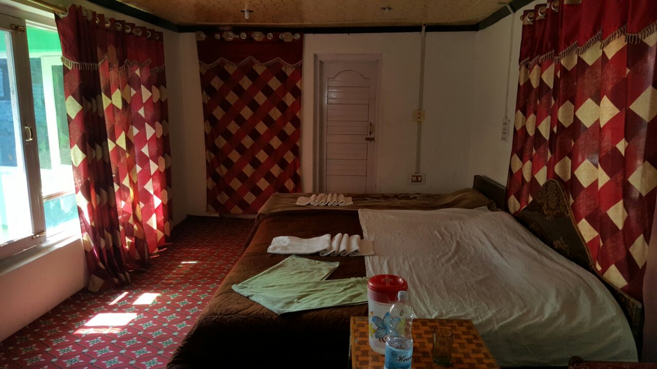 Hotel Evergreen  - Tap to explore photos