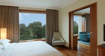Hilton Bangalore Embassy GolfLinks Room Type - King One Bedroom Suite with Kitchenette, Bathtub & Cocktail hours Hilton Bangalore Embassy GolfLinks Room Type - King One Bedroom Suite with Kitchenette, Bathtub & Cocktail hours