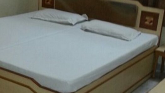 Hotel Manish - Tap to explore photos