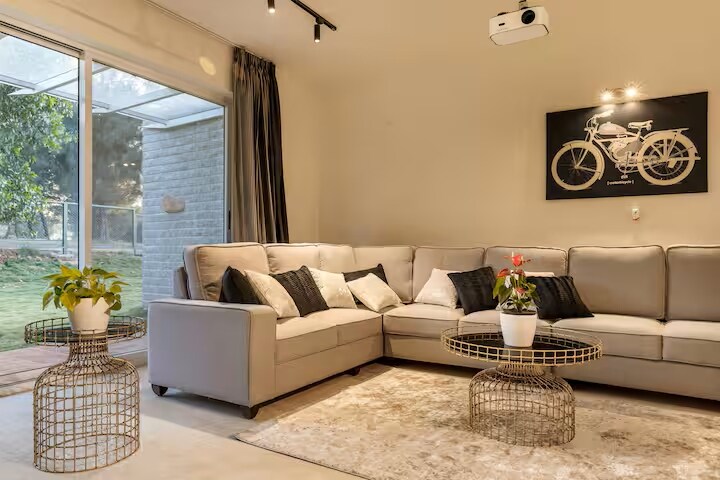 Golf View Home by StayJade | 4BHK Villa with Garden and Projector | Bangalore - Tap to explore photos