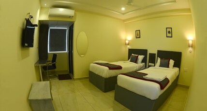 Seasons stay, Vijaywada Room Type - Seasons double twin bed