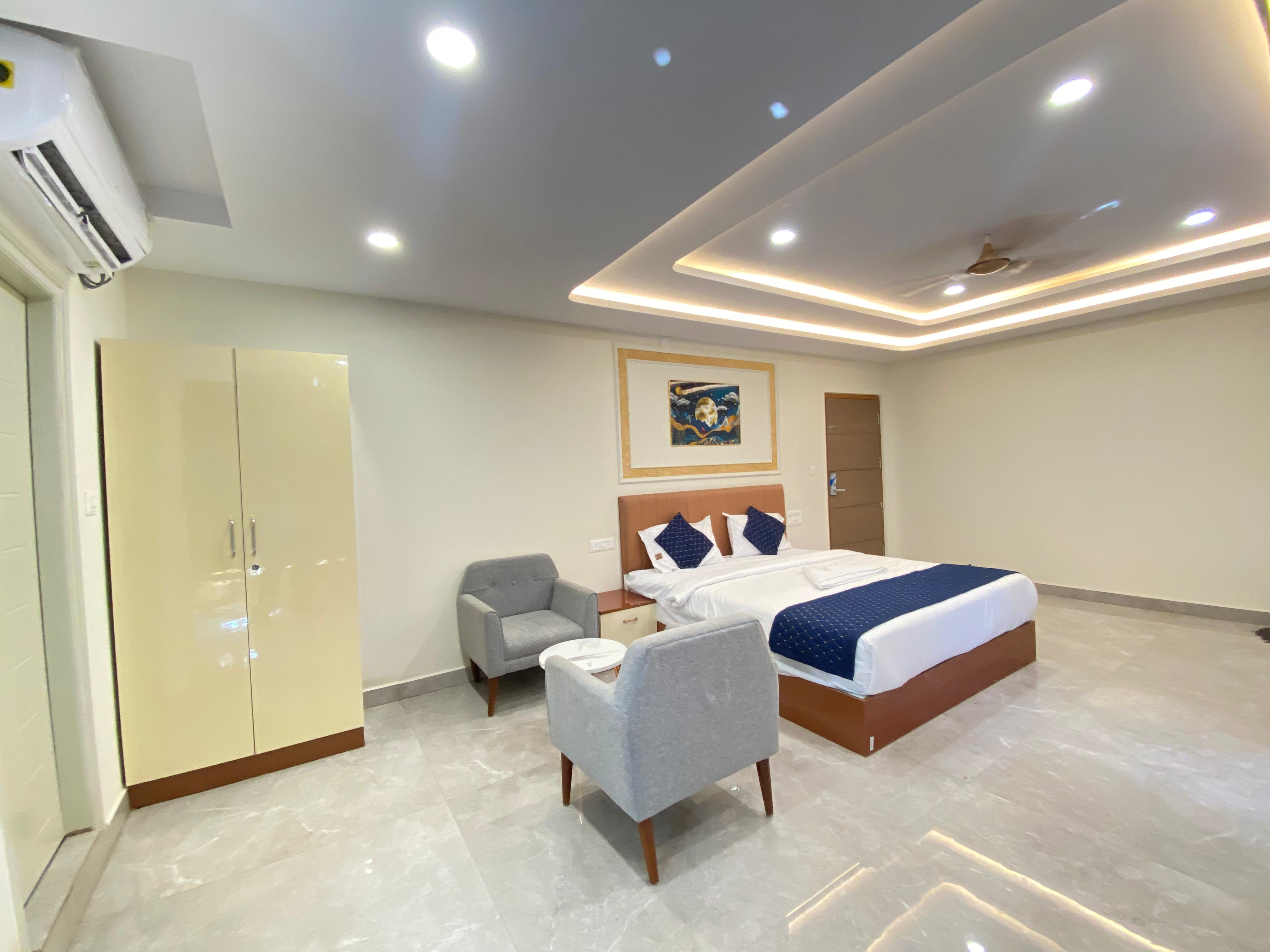 FIODA ROYAL ROOMS KR PURAM - Tap to explore photos