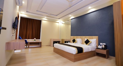 Hotel Nirvana Inn and Banquet Near Expo Mart Room Type - Suite Room With Welcome Kit Hotel Nirvana Inn and Banquet Near Expo Mart Room Type - Suite Room With Welcome Kit