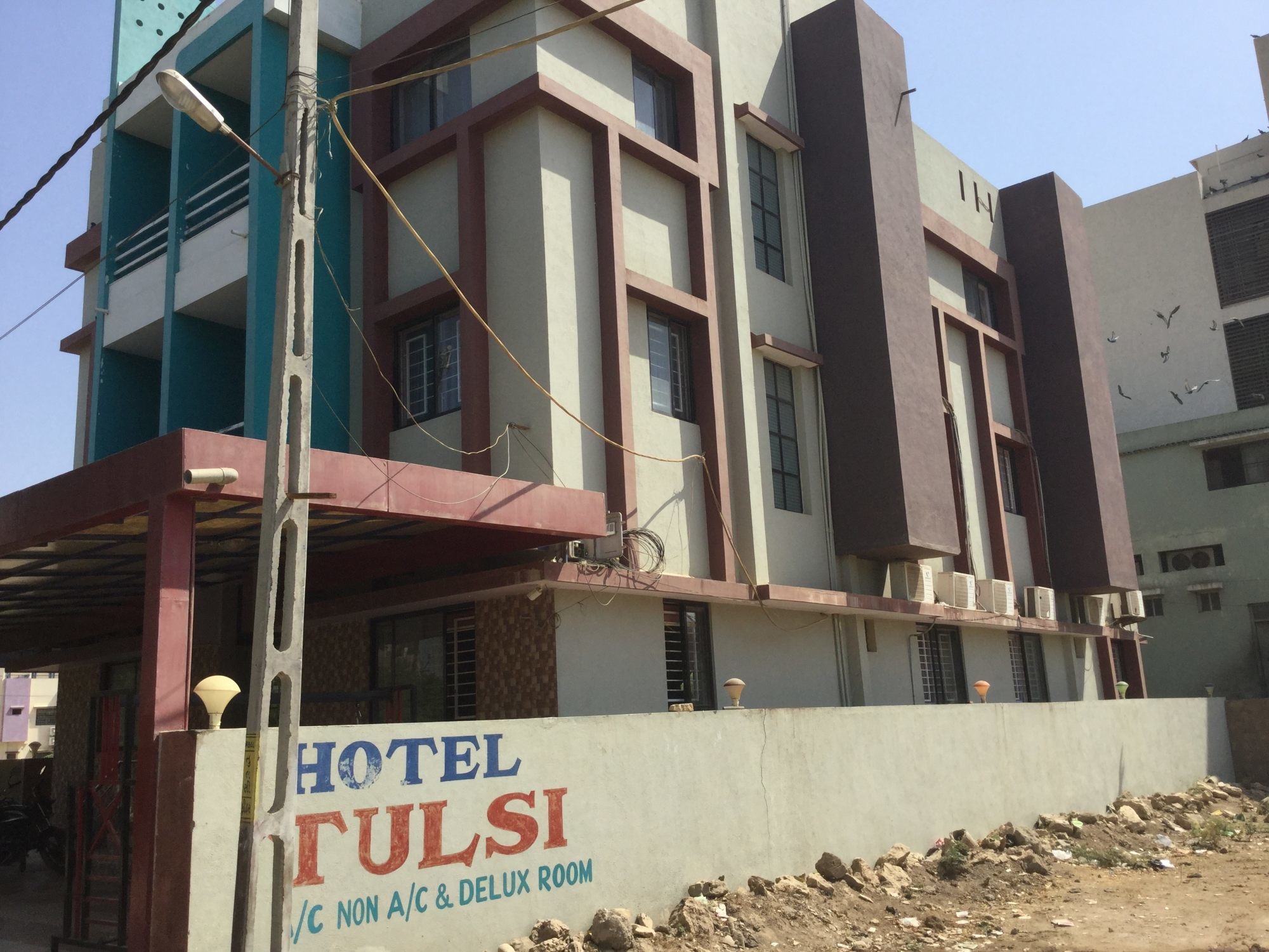 Hotel Tulsi - Tap to explore photos