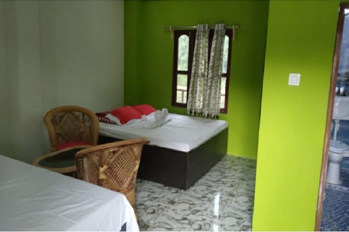 Orchid Homestay - Tap to explore photos