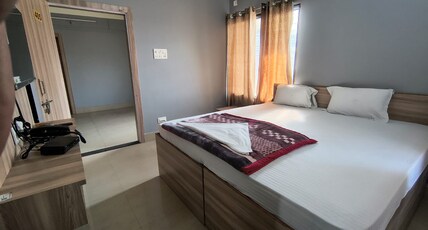 Peace & Bliss Guest House Room Type - Non AC deluxe (shared washroom)
