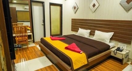 Hotel Kumar Plaza Room Type - AC SUITE WITH BALCONY