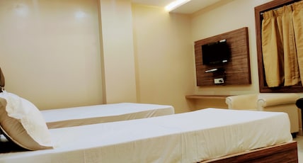 Hotel Guru Estate (Pure Veg , 3 mnts from Jagannath temple) Room Type - Premium Triple Bed Hotel Guru Estate (Pure Veg , 3 mnts from Jagannath temple) Room Type - Premium Triple Bed
