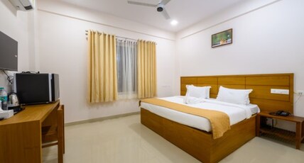 DAFFODILS AIRPORT SUITES Room Type - Deluxe Suite With Living Area
