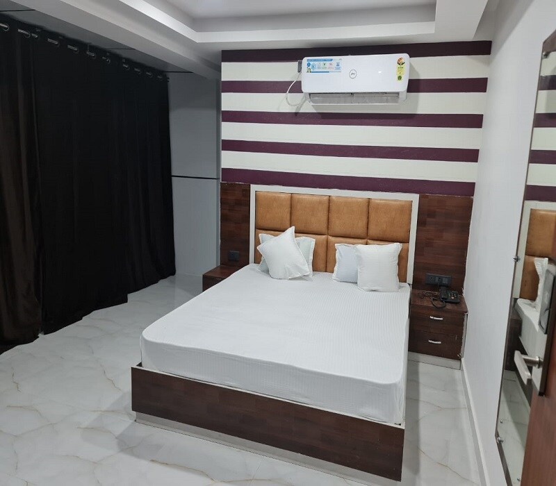 HOTEL AMITANSH - Tap to explore photos