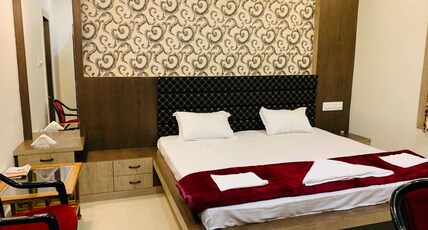 Tulsi guest house Room Type - Deluxe Room with King bed