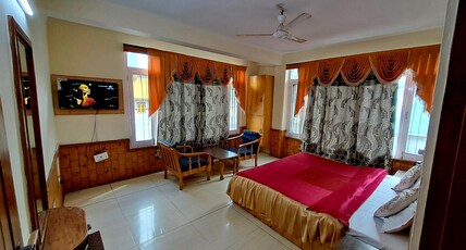 Hotel Snow Mountain Mall Road Manali Room Type - Family Suite 4 Bed Room