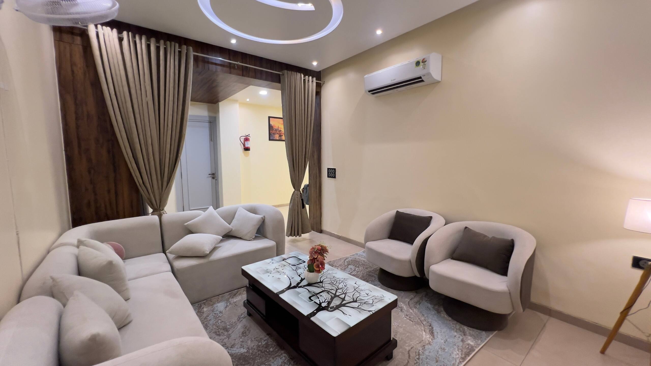 Elegant Escape Modern 2BHK with Living Room - Tap to explore photos
