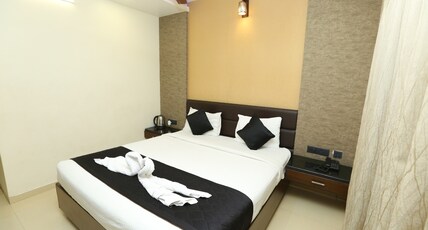 NITHYAA GRAND Room Type - Deluxe Double Room