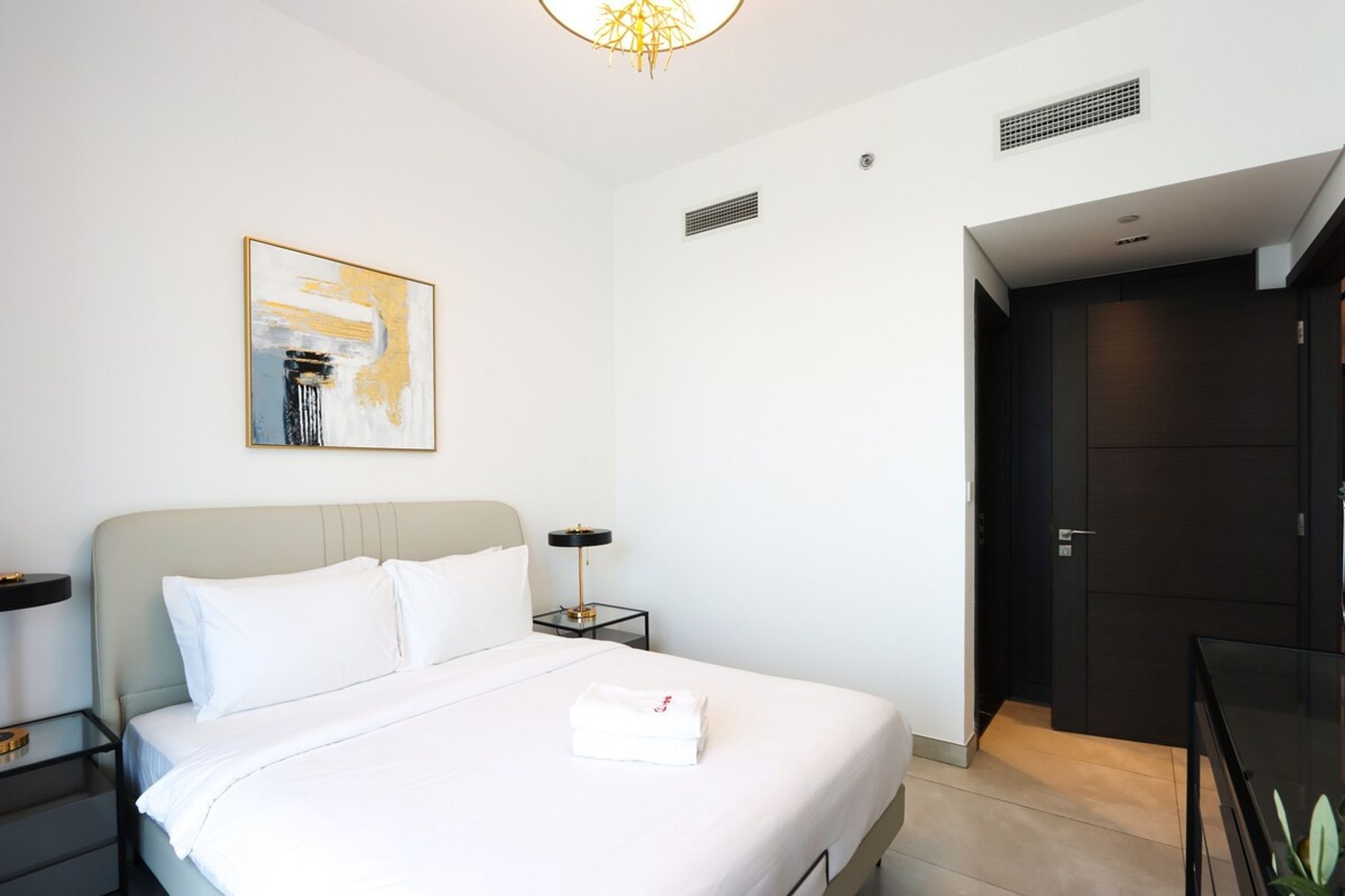 ELIVAAS Curated 1BR Paragon Tower | Burj Khalifa & Canal Views - Tap to explore photos