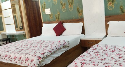 HOTEL GURU KALGIDHAR RESIDENCY Room Type - Super Deluxe Room