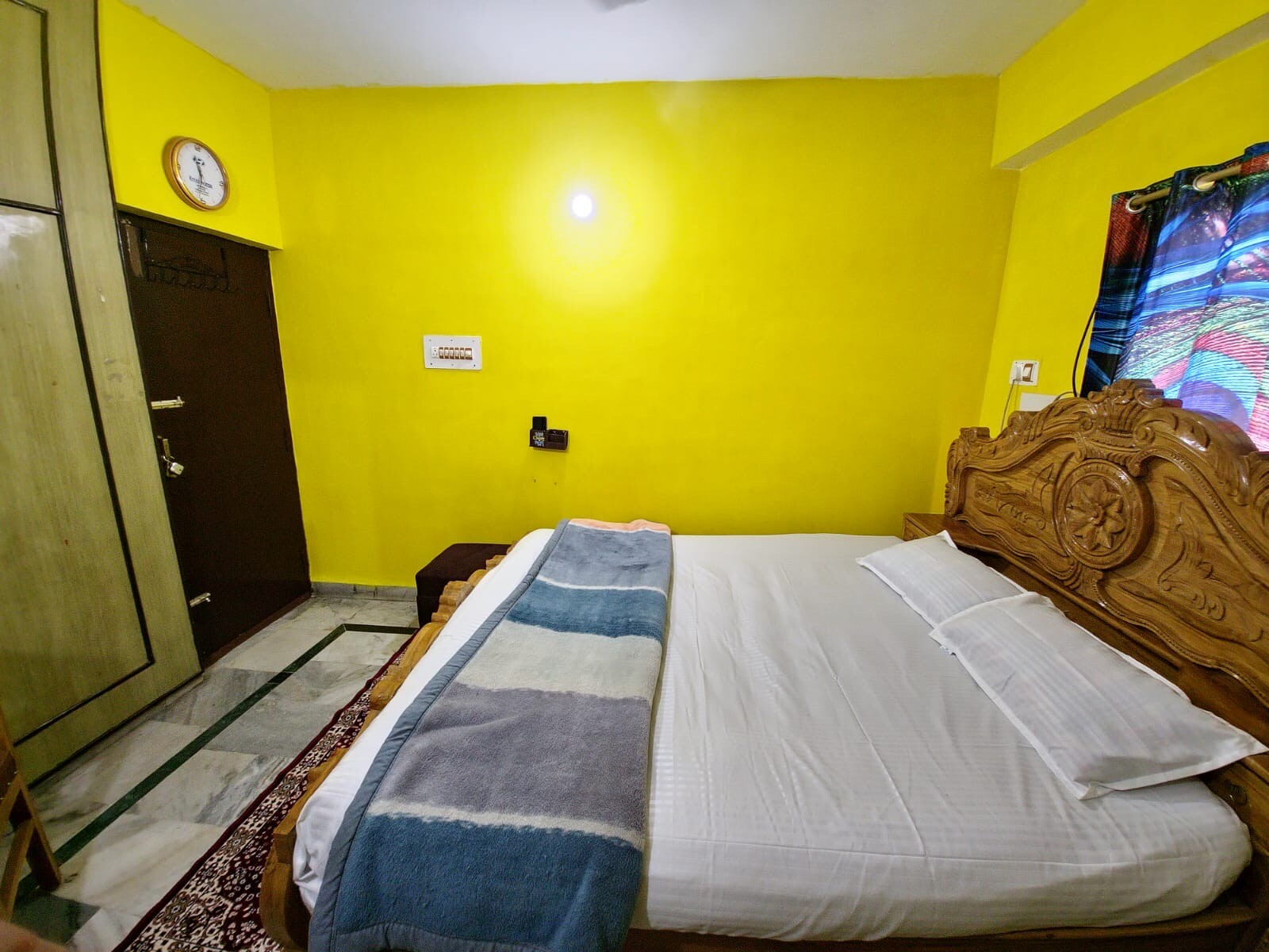 Clean and spacious room - Tap to explore photos