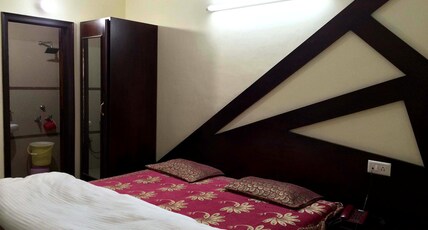 SANTOSH HOTEL Room Type - Deluxe AC Room