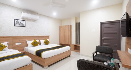 Hotel Prime Inn Room Type - Deluxe Triple Bed Room